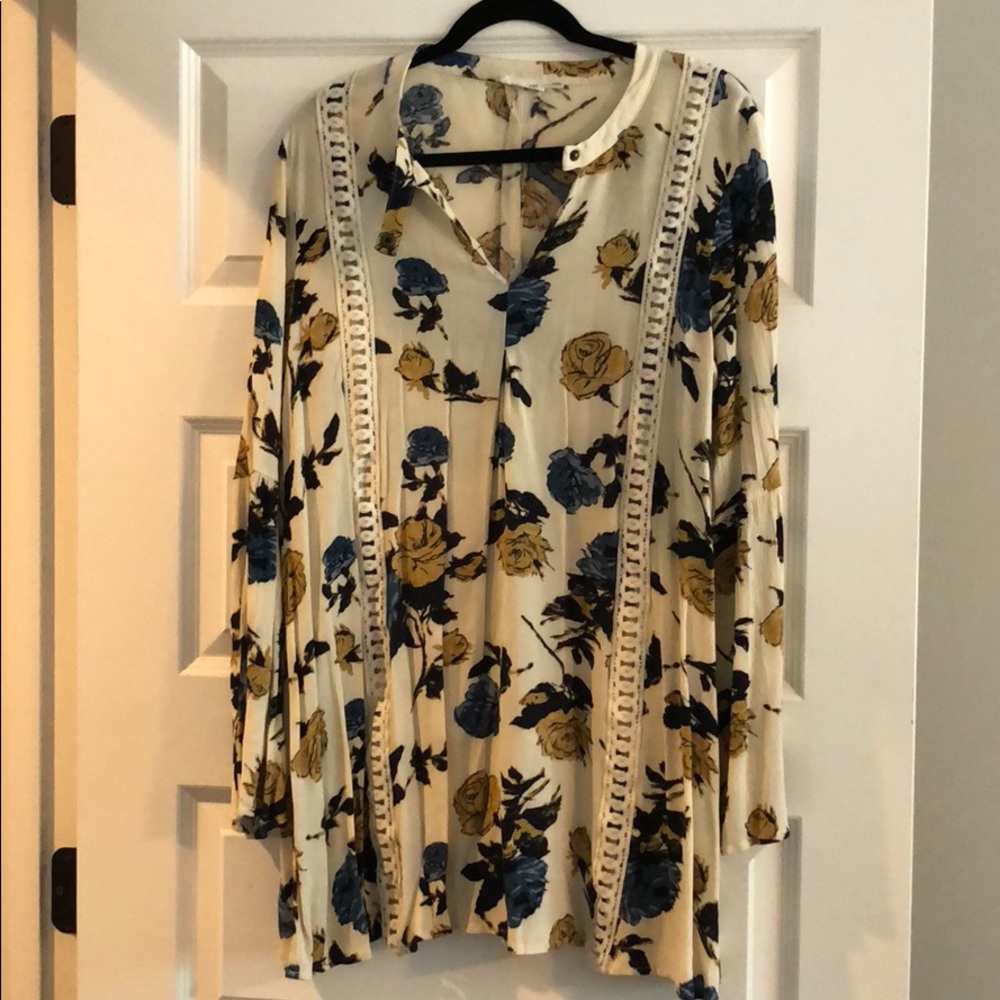 Cream long sleeved dress
